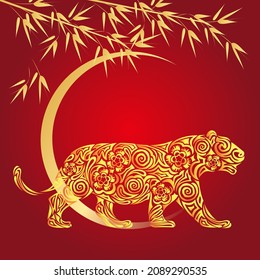 2022 Chinese New Year (year of the tiger). Vector illustration of tiger with bamboo branches and moon in paper cut style.
