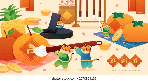 2022 CNY greeting card. Cute tigers in Chinese costumes work together on making handwriting couplets in study room. Text of welcoming Spring Festival written in Chinese on the lower right