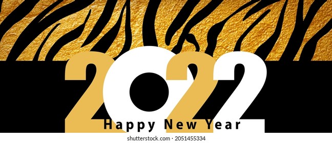 2022 Happy New Year. Numbers 2022 on black background. Tiger fur as background. Tiger the symbol of the new year 2022. Black tiger stripes on gold texture.