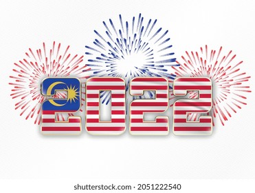 2022 New Year background with national flag of Malaysia and fireworks
