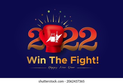 2022 New year creative concept with strong raising hand powerful punch and covid 19 corona vaccine for win and grow up