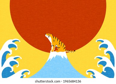 2022 New Year's card, Tiger year, Tiger and waves sitting at the top of Mt. Fuji with the first sunrise in the background