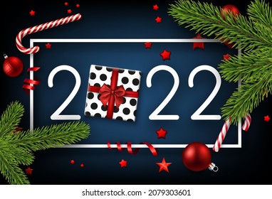 2022 sign with gift box in square frame. Red candy canes, baubles and stars confetti. Vector festive illustration.