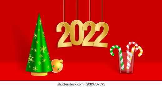 2022 Year golden garland, Christmas tree and candy canes in transparent glass.  Merry Christmas and Happy New Year background with 3d decor. 