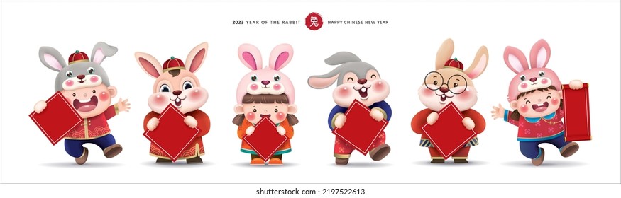 2023 Chinese new year  year the rabbit  Cute little kids   rabbits holding blank red blessing card for  own text 