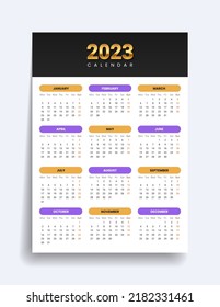 2023 gold calendar. Twelve months on one page. Red Sunday at the end of the week. Vector template