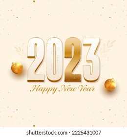 2023 Happy New Year Font With 3D Golden Baubles On Beige Background.