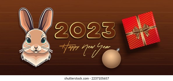 2023 Happy New Year. Horizontal vector banner with cute rabbit, Christmas gift box, Christmas tree toy on a wooden table, top view