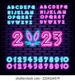 2023 Happy New Year and Merry Christmas alphabet Neon signboards. Neon script. Night advensing. Modern trend design. Vector Illustration