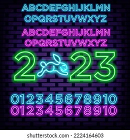 2023 Happy New Year and Merry Christmas alphabet Neon quote. On brick wall background. Light banner. Bright colored vector. Vector Illustration