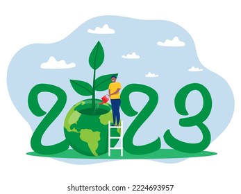 2023 Happy Young man water the planet Earth World Earth Day concept of conservation, protection and reasonable consumption of natural resources