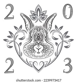 2023 New Year of Chinese horoscope greeting card with patterned rabbit head.