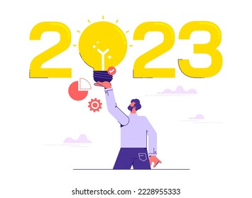 2023 new year with creative inspiration light bulb idea, man holding creative light bulb idea with 2023 word

