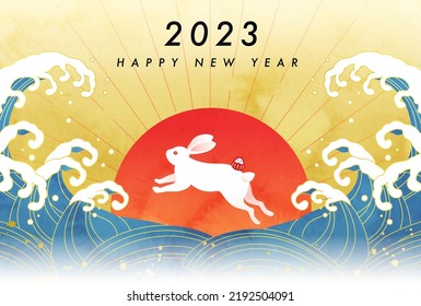 2023 New Year's card with rabbits, sunrise and waves.