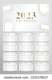 2023 year calendar in gold design. White background and gold color combination