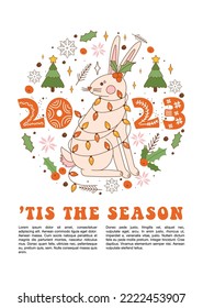 2023 is the year of the rabbit. Christmas retro greeting poster with groovy rabbit, garland, spruce, holly berry, snowflake and holiday objects. Lettering quote in 70s style. Vector illustration.