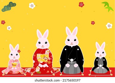 2023 Year of the Rabbit New Year's card, kimono-clad rabbit family and pine, bamboo, and plum