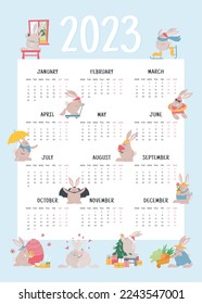 2023 year of the rabbit poster calendar. Calendar with illustrations of cute rabbit doing different sesonal activities