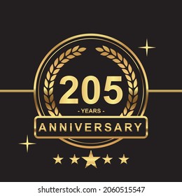 205 years anniversary golden color with circle ring and stars isolated on black background for anniversary celebration event luxury gold premium vector