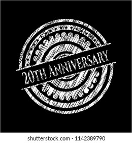 20th Anniversary chalkboard emblem written on a blackboard