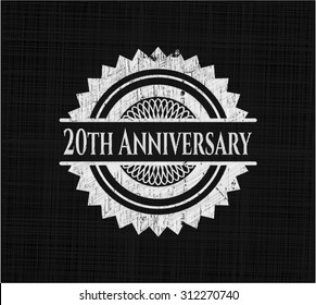 20th Anniversary chalkboard emblem written on a blackboard