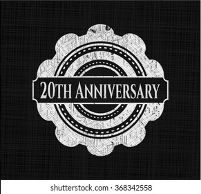 20th Anniversary written on a chalkboard