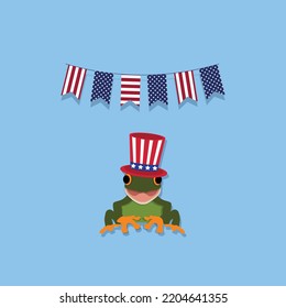 21 OCT - American Frog Day - A green frog waring USA flag hat, United States of America Flag in background