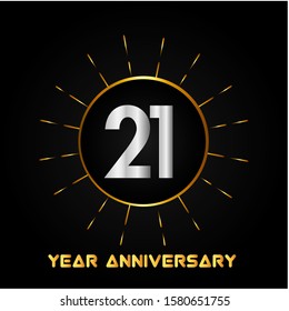 21 years anniversary golden and silver color with circle ring isolated on black background for anniversary celebration event