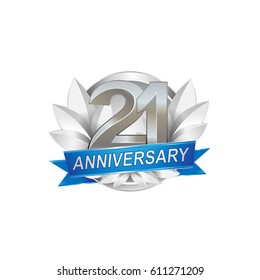 21st Anniversary logo with silver wreath, silver number, blue ribbon