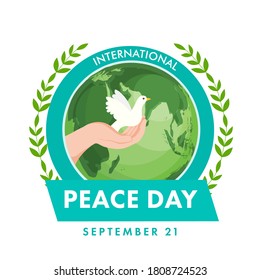 21st September, International Peace Day Concept with Human Hand Holding Dove, Olive Leaves and Earth Globe on White Background.