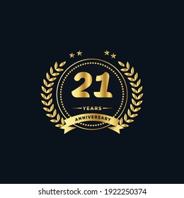 21th golden anniversary logo, with shiny ring and golden ribbon, laurel wreath isolated on navy blue background