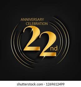 22 anniversary gold with a circle frame and a dark background, giving the impression of luxury