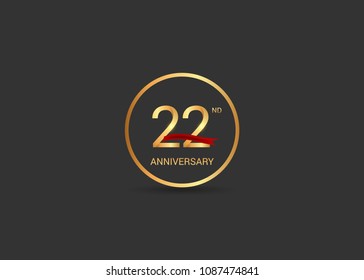 22 anniversary vector design golden color with ring and red ribbon isolated on black background