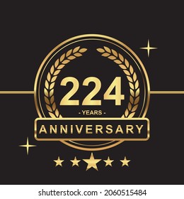 224 years anniversary golden color with circle ring and stars isolated on black background for anniversary celebration event luxury gold premium vector