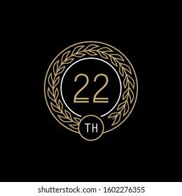 22st anniversary logo with gold and white frame and color. on black background