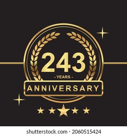 243 years anniversary golden color with circle ring and stars isolated on black background for anniversary celebration event luxury gold premium vector