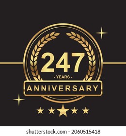 247 years anniversary golden color with circle ring and stars isolated on black background for anniversary celebration event luxury gold premium vector