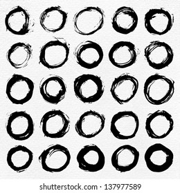 25 circle form black brush stroke. Drawing created in ink sketch handmade technique. Shapes on white paper watercolor texture background. Vector illustration design element in 8 eps