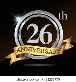 26th anniversary logo, with shiny silver ring and gold ribbon isolated on black background. vector design for birthday celebration.