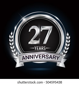 27 years silver anniversary logo with laurel wreath, ribbon and silver ring. vector design