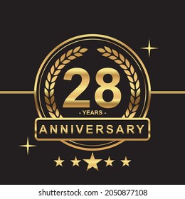 28 years anniversary golden color with circle ring and stars isolated on black background for anniversary celebration event luxury gold premium vector