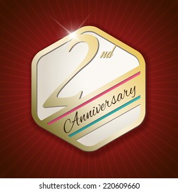 2nd Anniversary - Classy and Modern golden emblem / Seal / Badge - vector illustration on read rays background