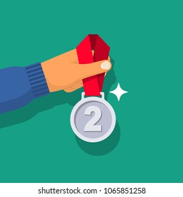 2nd place. Silver medal in the hand of athlete. Medal with ribbon. Sportsman winner is awarded prize. Vector illustration flat design style. Victory isolated on white background. Championship winner.