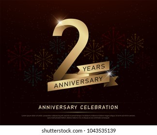 2nd years anniversary celebration gold number and golden ribbons with fireworks on dark background. vector illustration