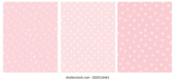 3 Cute Abstract Geometric Vector Patterns. White Hand Drawn Spots, Triangles and Dots Isolated on a Pastel Pink Background. Irregular White Scribbles Print. White Polka Dots on a Pink. Dotted  Layout.