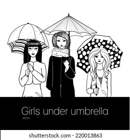 3 girls under umbrellas.