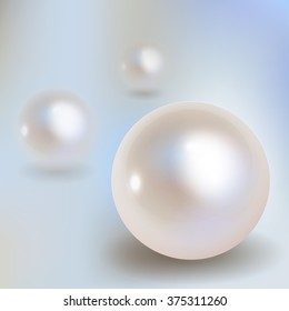 3 Pearls vector with shadow on a light blue bokeh fog background.