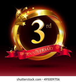 3 years anniversary celebration with golden ring and red ribbon.
