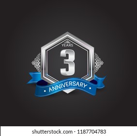 3 years anniversary logotype design with blue ribbon, silver hexagon, and ornament isolated on dark background. Vector template for celebration company event, greeting card, and invitation card