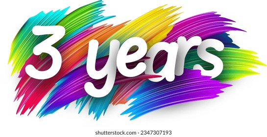3 years paper word sign with colorful spectrum paint brush strokes over white. Vector illustration.